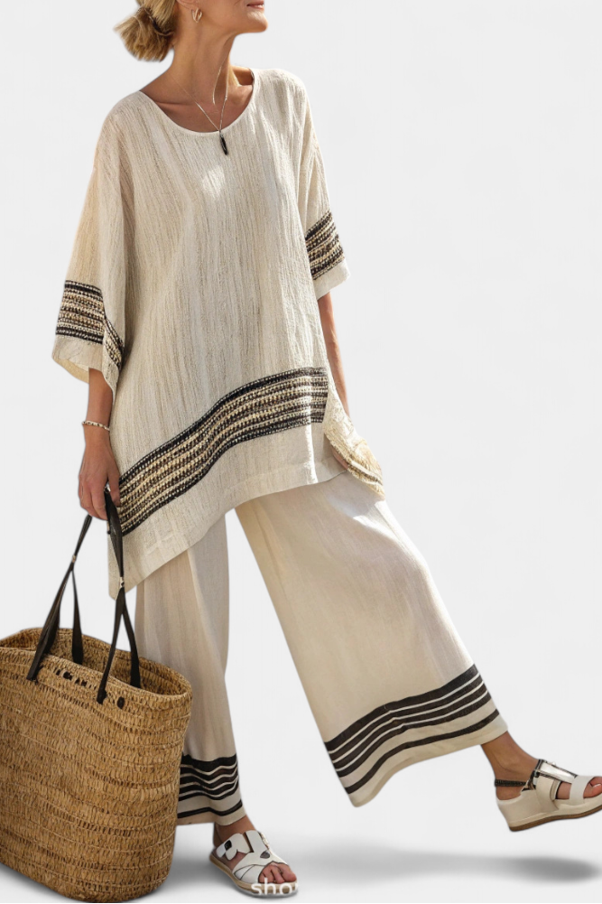Mariella – top de lino a rayas negras elegante y pantalones fluidos