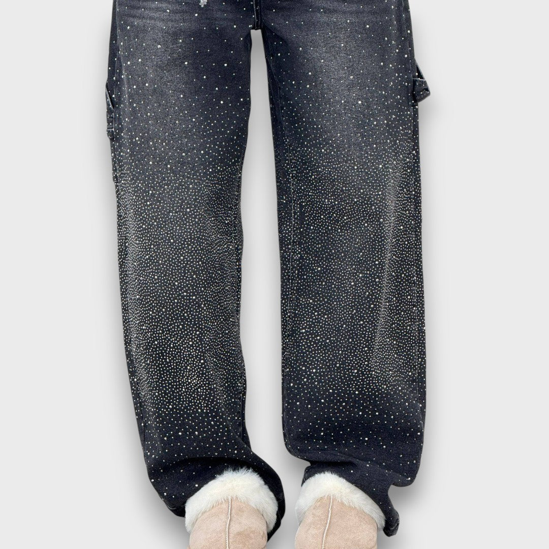 Nolene – Jeans con acabado brillante y carácter urbano