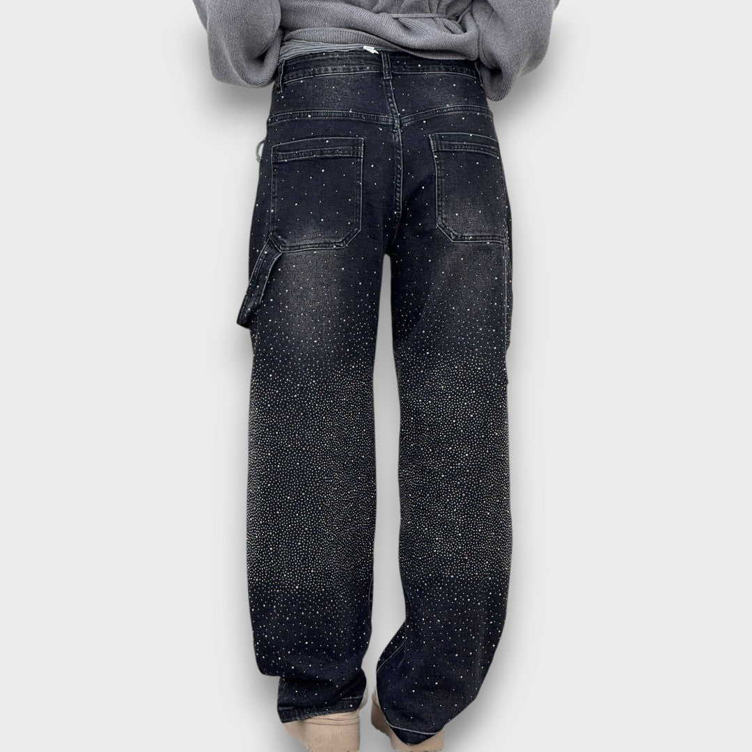 Nolene – Jeans con acabado brillante y carácter urbano