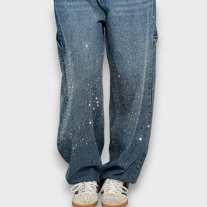 Nolene – Jeans con acabado brillante y carácter urbano